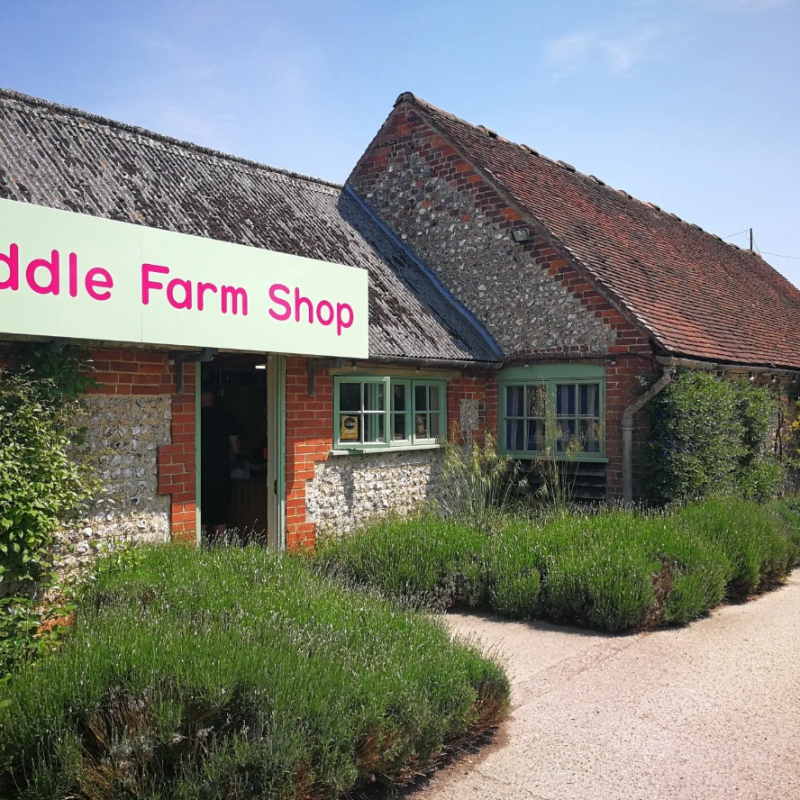 a house that has a sign on the side of a building