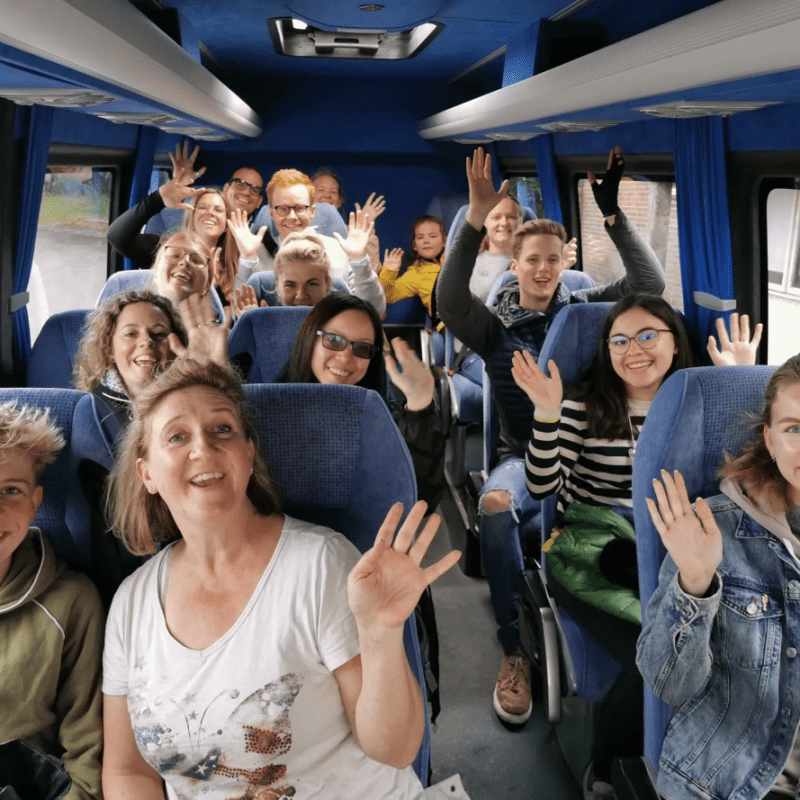 a group of people posing for the camera