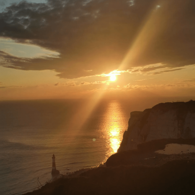 a sunset over a body of water